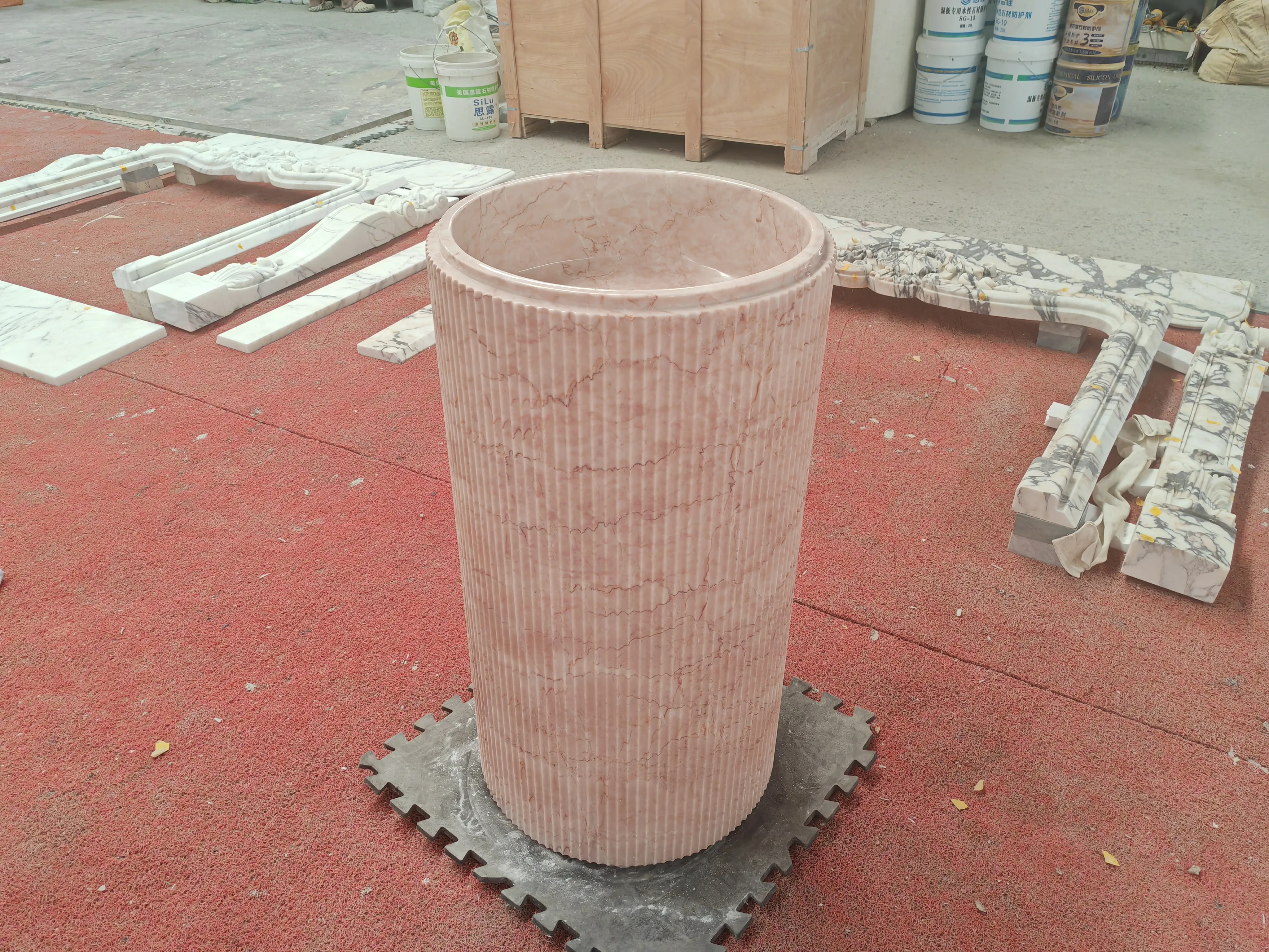 Reference photo — fluted pink marble column close-up